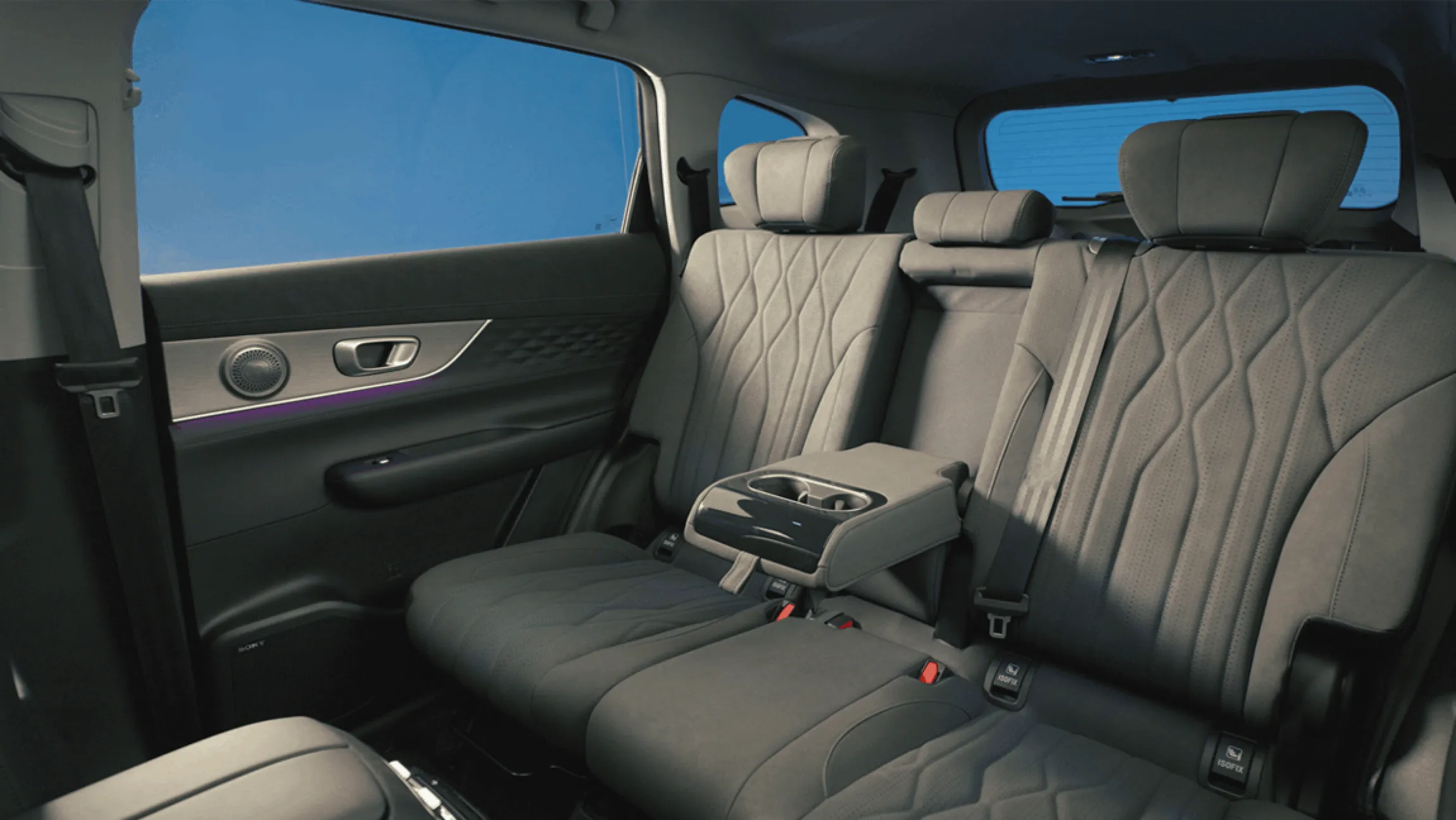 Chery Tiggo 8 SUV interior showing rear passenger seats in black leather with diamond-pattern stitching